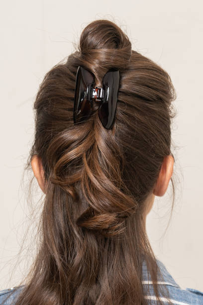 istock Woman With Hair Clips 1220423381