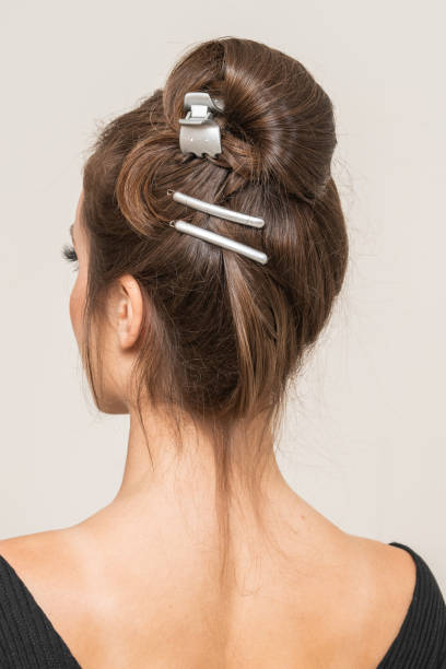 istock Woman With Hair Clips 1220423779