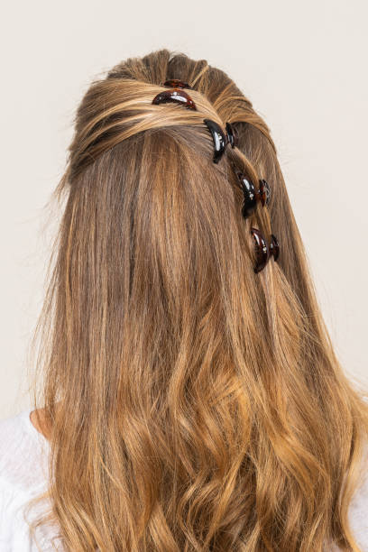 istock Woman With Hair Clips 1220423821