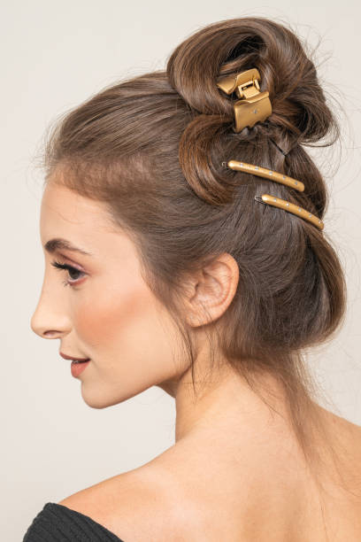 istock Woman With Hair Clips 1220423834