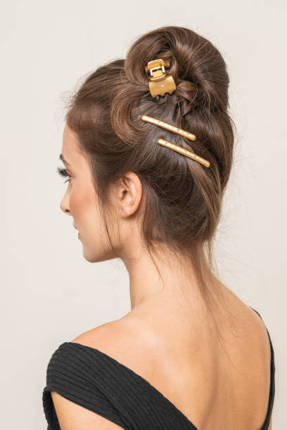 istock Woman With Hair Clips 1220423903