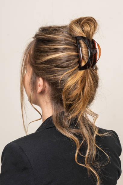 istock Woman With Hair Clips 1220423953