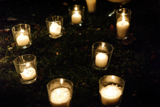istock romantic candle light in glass lanterns at luxury wedding ceremony in evening, decor and arrangements 1220424111