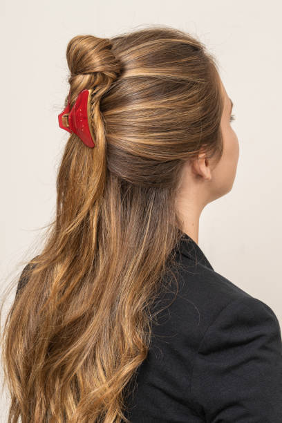 istock Woman With Hair Clips 1220424849