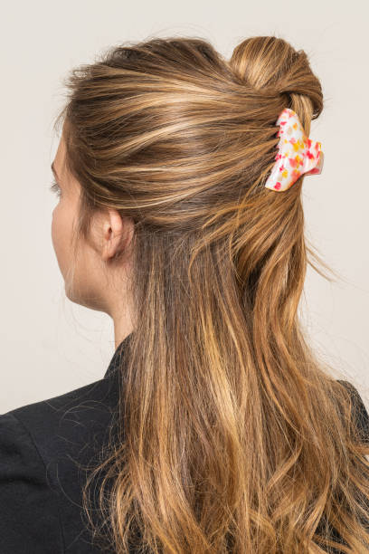 istock Woman With Hair Clips 1220424930