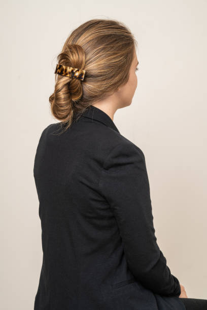 istock Woman With Hair Clips 1220424998