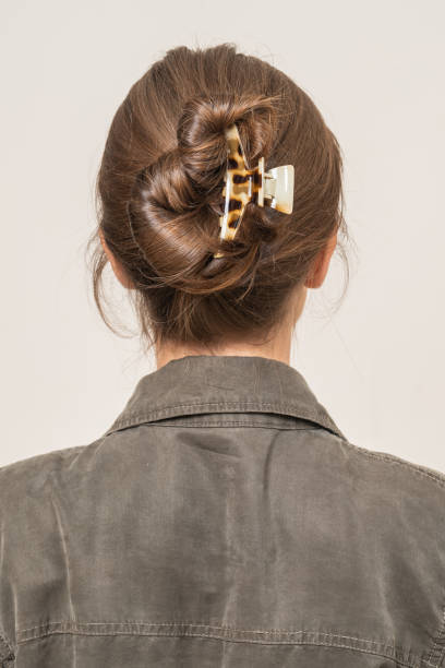 istock Woman With Hair Clips 1220425030