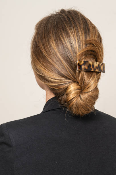 istock Woman With Hair Clips 1220425035