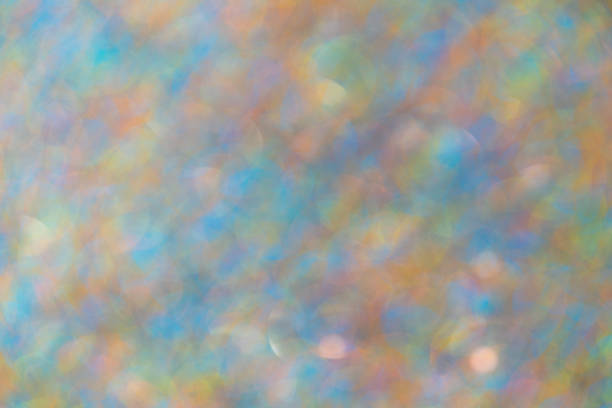 istock Abstract shiny colored sparkles background with  bokeh blurred background 1220425142