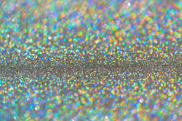 istock Abstract shiny colored sparkles background with  bokeh blurred background 1220425145