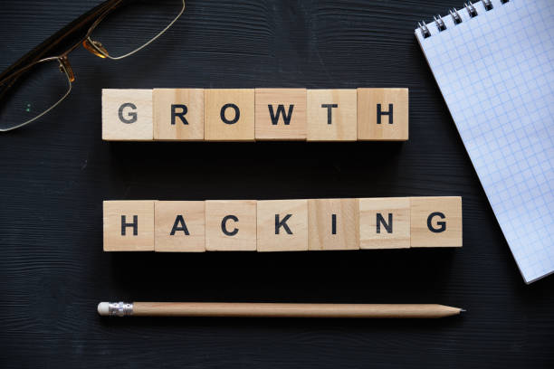 istock Modern business buzzword - growth hacking. Top view on wooden table with blocks. Top view. 1220426881