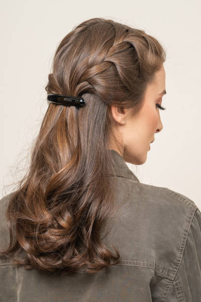 istock Woman With Hair Clips 1220427035