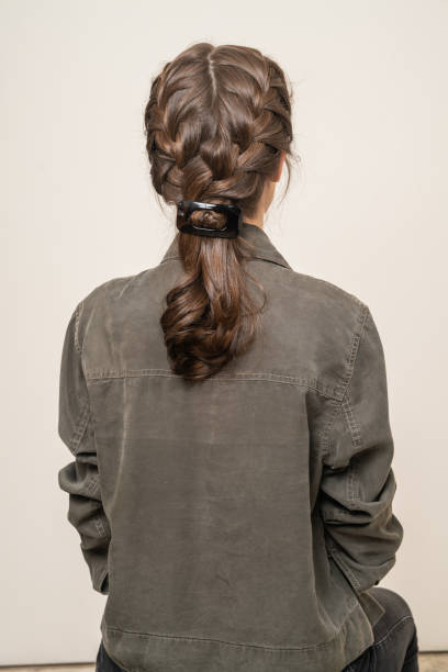 istock Woman With Hair Clips 1220427037