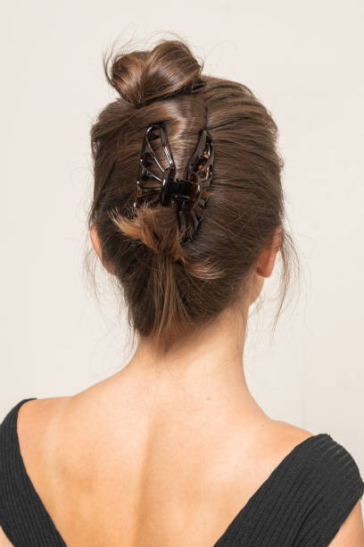 istock Woman With Hair Clips 1220427667