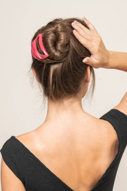 istock Woman With Hair Clips 1220427737