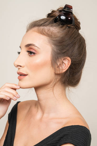 istock Woman With Hair Clips 1220427981