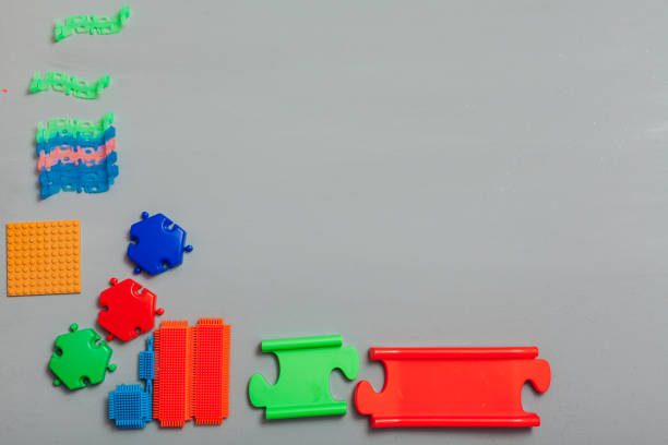 istock Children's developing games collect designer on a gray background 1220428109