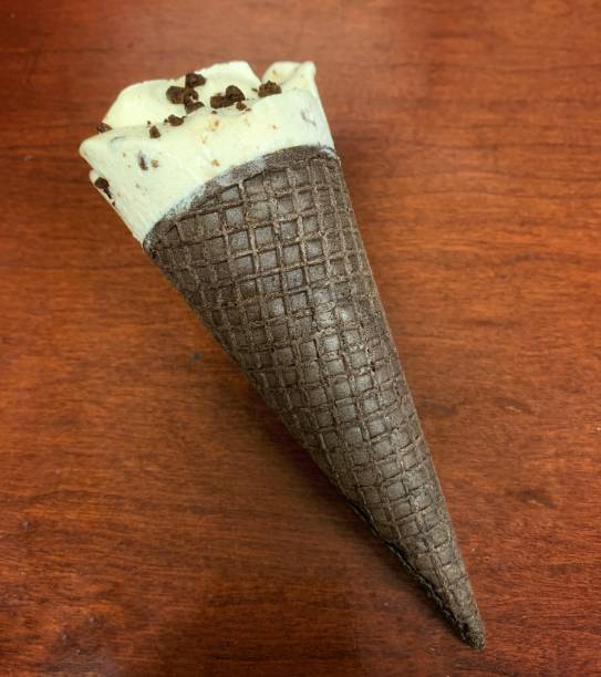 istock Cookies and cream ice cream cone 1220428163