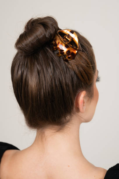 istock Woman With Hair Clips 1220428371