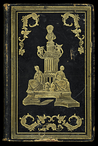 Antique black and gold hardcover book.