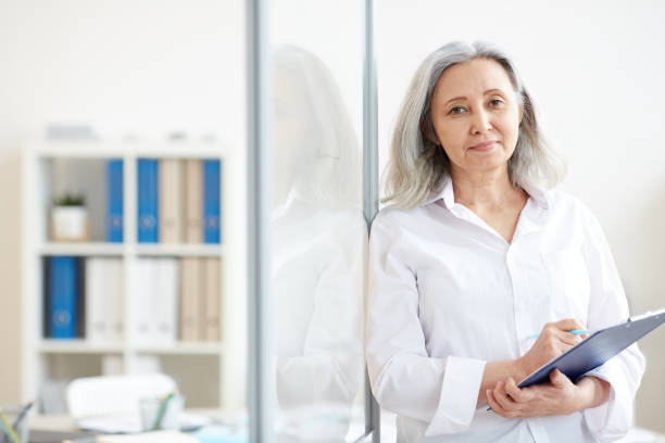 istock Successful Senior Businesswoman in Office 1220432571