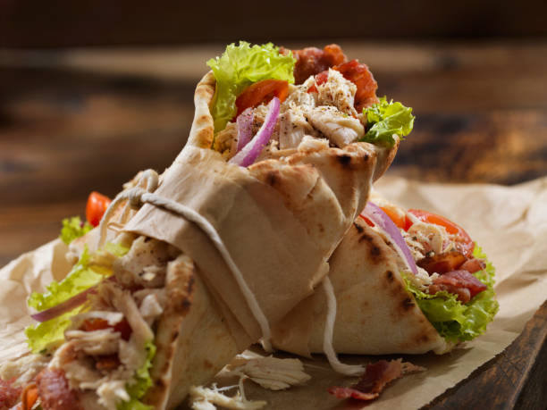 istock Roast Chicken BLT in a Pita Bread Wrap Sandwich 1220435244