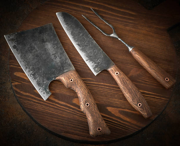 istock Stylish Butcher's Set: cleaver, knife and fork. Top view 1220436500