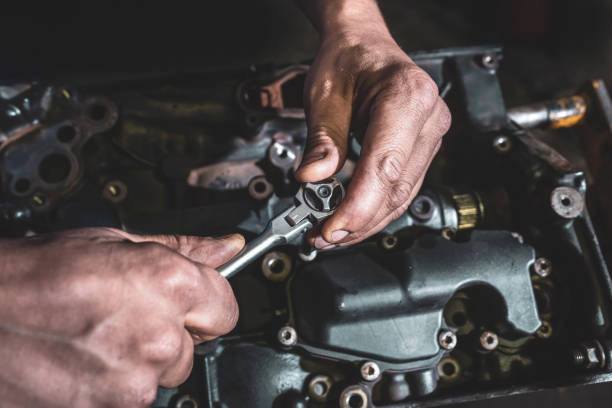 istock Hands with wrench. Repair service. Car service. 1220439202