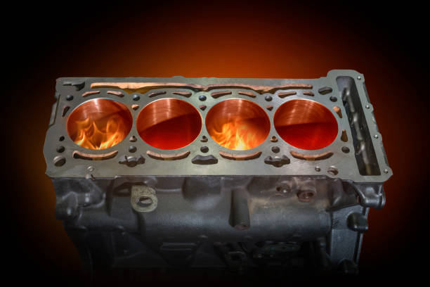 istock Disassembled engine burning in flames on a dark red background. Repair service. 1220441351