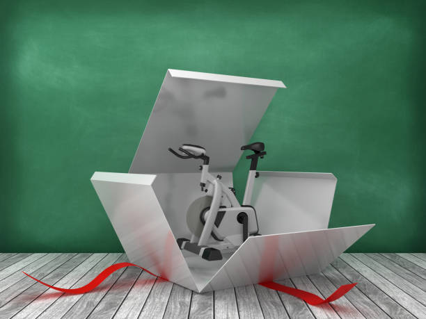 istock Gift Box with Exercise Bike  on Chalkboard Background - 3D Rendering 1220447206