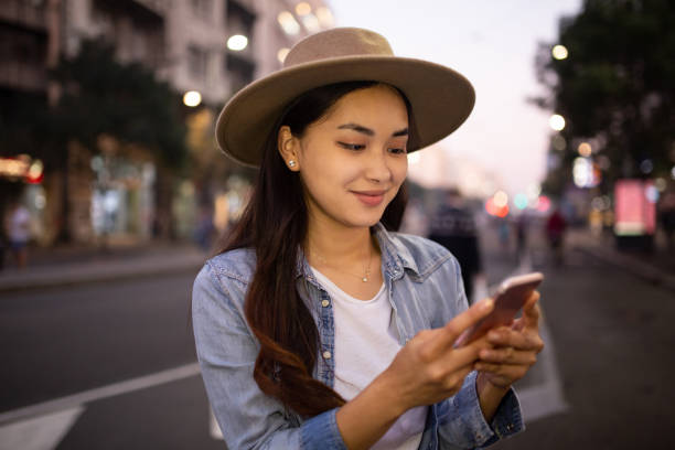 istock Beautiful young woman exploring the city 1220449090
