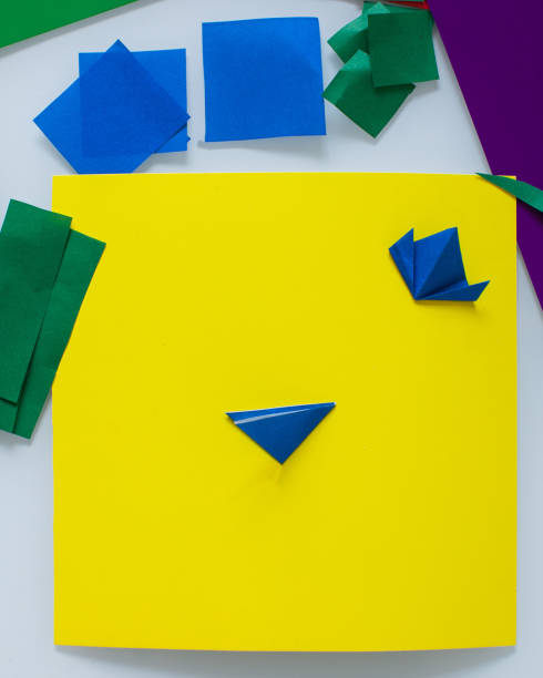 istock DIY and children's creativity, a do-it-yourself gift for mother's day. Step by step instructions for paper applications, origami technique. Step 3. 1220449215