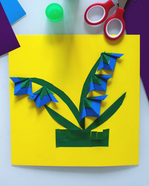 istock DIY and children's creativity, a do-it-yourself gift for mother's day. Step by step instructions for paper applications, origami technique. Step 9 1220449498