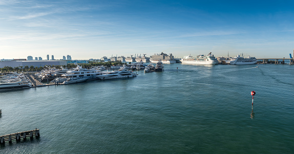 Miami, FL, USA - April 22, 2020: Cruise ships stopped at the port due to the global crisis of the Coronavirus epidemic (COVID-19) in the Port of Miami, one of the busiest ports in the United States.