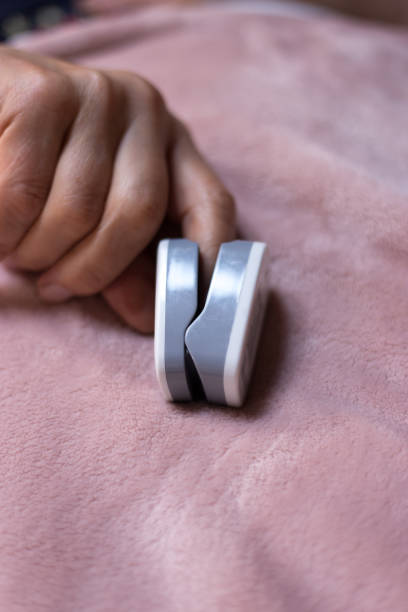 Bed-Ridden Person with Oximeter on Finger