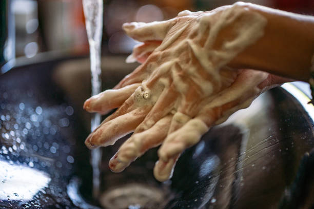 istock Close-up woman's hands with foam 1220455388