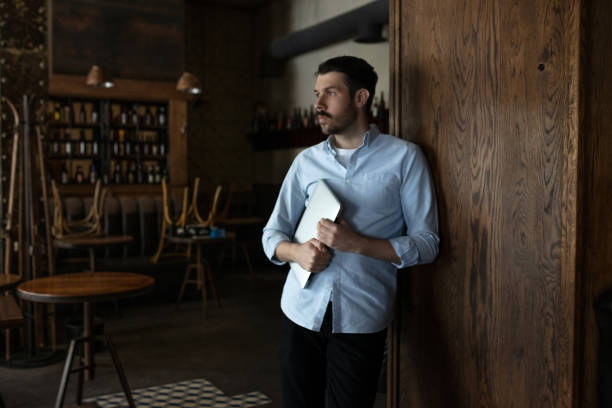 istock Public institutions closed due to COVID-19 or Coronavirus outbreak lockdown, stressed owner of small business alone in his cafe, despair 1220458363