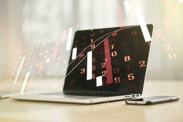 istock Abstract creative financial graph on modern laptop background, financial and trading concept. Multiexposure 1220459018