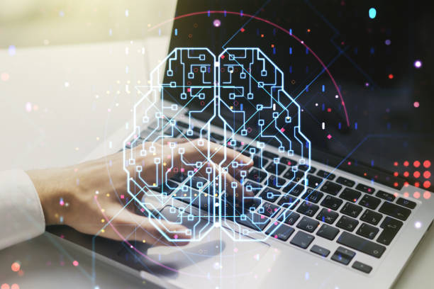 istock Double exposure of creative human brain microcircuit with hand typing on computer keyboard on background. Future technology and AI concept 1220459202