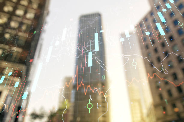istock Double exposure of abstract financial graph with world map on office buildings background, forex and investment concept 1220460062