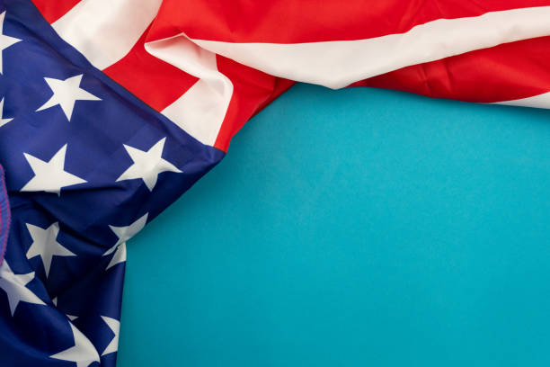istock American Flag on blue background with copy space for your text. 1220461329