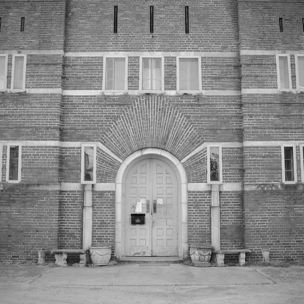 istock Black and white photograph of an old brick structure 1220462554