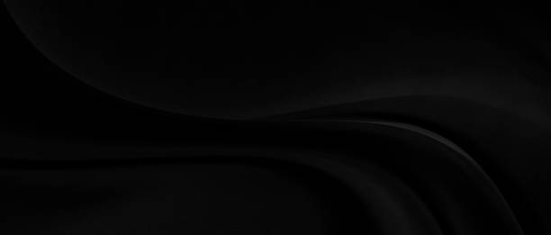 istock Black gray satin dark fabric texture luxurious shiny that is abstract silk cloth panorama background with patterns soft waves blur beautiful. 1220463292