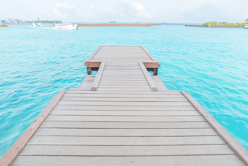 Wooden bridge jetty on the sea