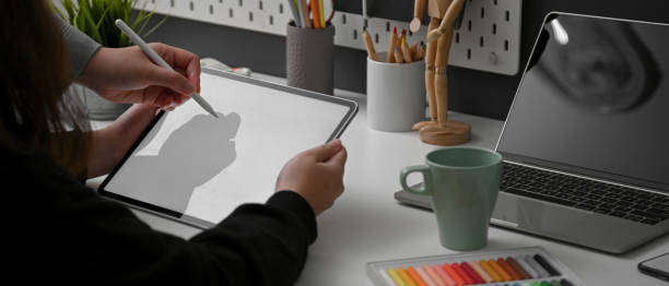 istock Cropped shot of two designers working together at comfortable workspace 1220474163