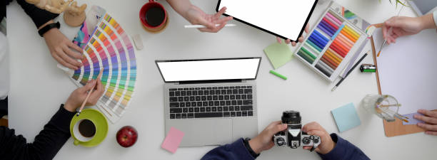 istock Designer team working together on their project in minimal meeting room 1220474164