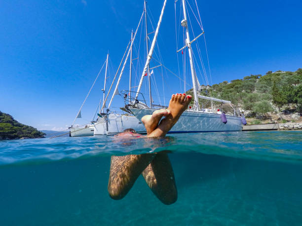 istock Woman floating in the clean sea. 1220478868