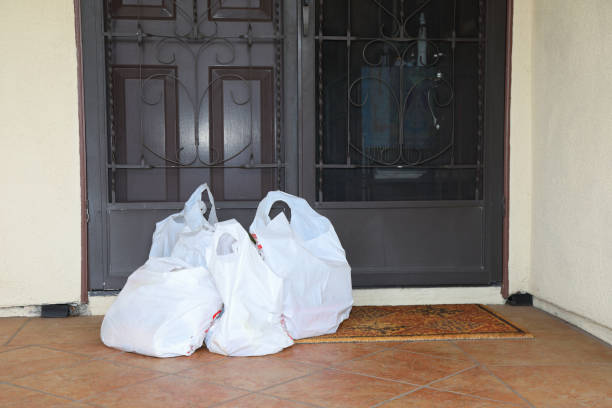istock COVID-19 Grocery Delivery on Porch Horizontal MS 1220483611
