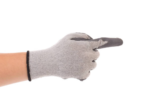 istock A hand in a rubberized protective gray glove shows the direction. 1220486816