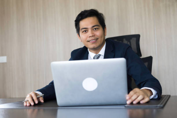 Picture of successful asian business is sitting at home and planning work new idea stock photo